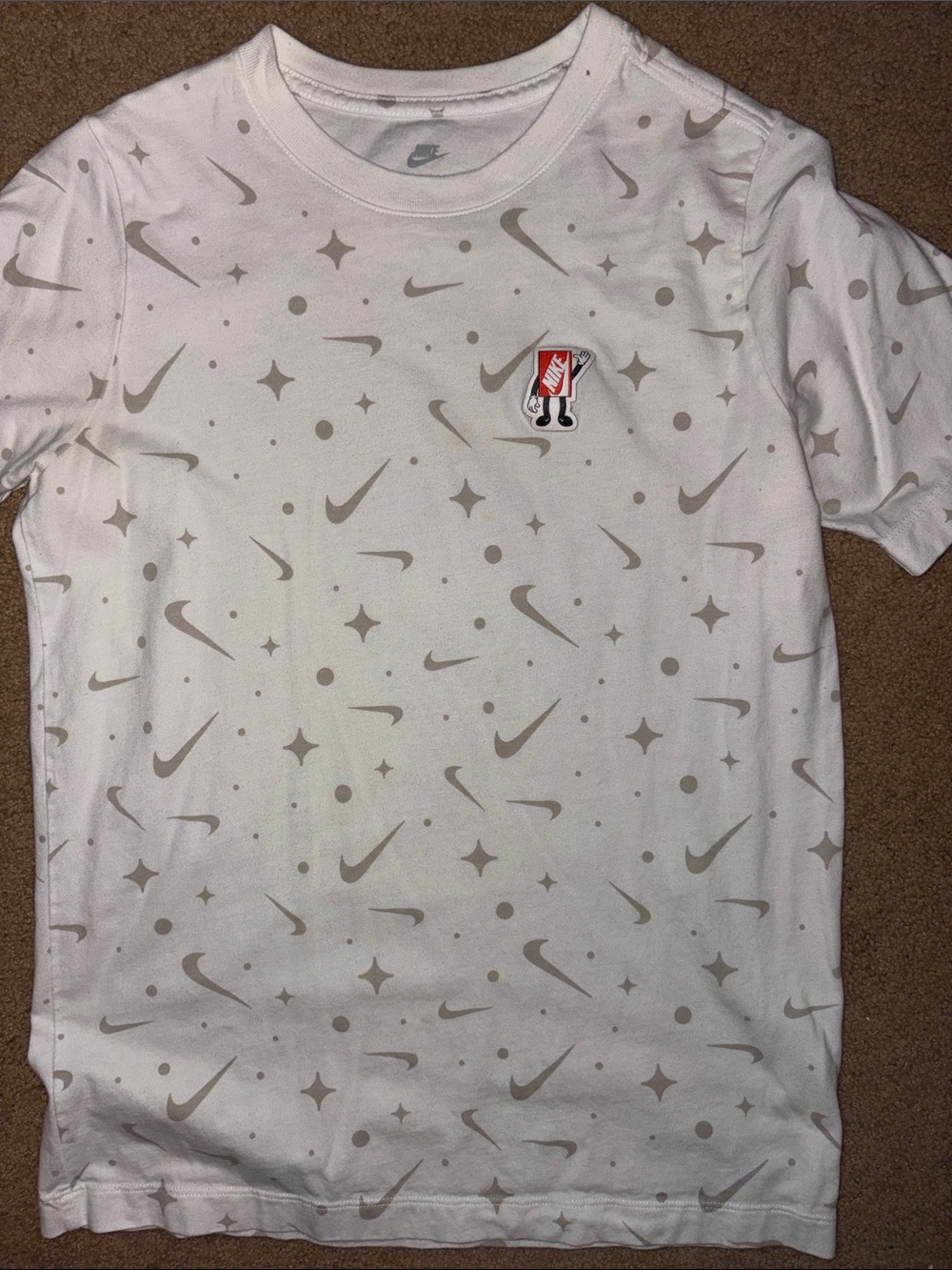 Nike White Tee with Light Gray Swoosh Allover Print
